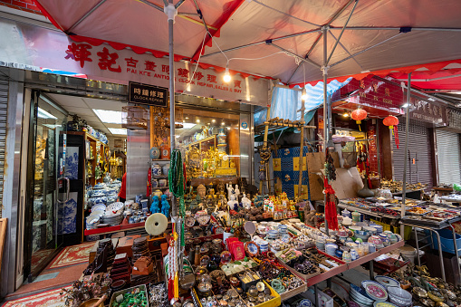 Hong Kong - January 27, 2023 : Upper Lascar Row in Sheung Wan, Hong Kong. Upper Lascar Row is the seemingly endless row of antique stores, offering an eclectic collection of Chinese calligraphy, arts and vintage furniture.