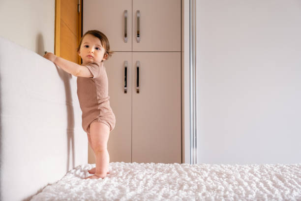 istock toddler boy having fun alone in his bed 1460175838