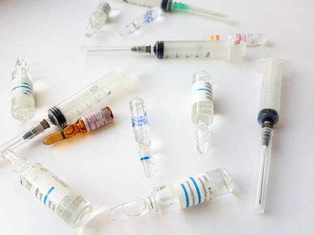 istock Pharmaceutical preparations. Antibiotics, syringes, ampoules on a white background. 1460175855