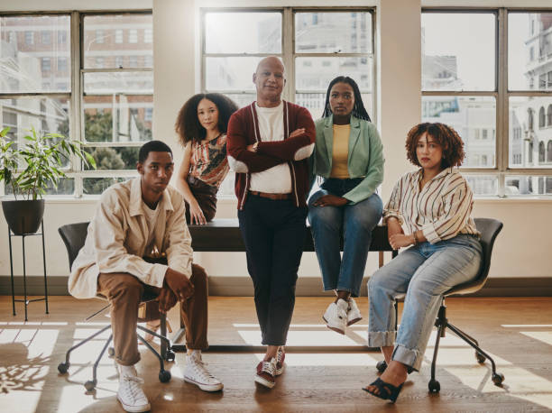 istock Professional portrait, team and diversity with creative group in office, focus and mindset with serious people. Career, business and company collaboration in startup, men and women working together 1460177651