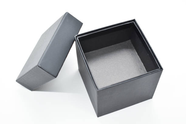 istock black paper box on white background, packaging industry 1460177891