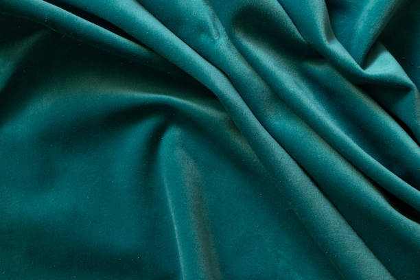 istock plain dark blue crumpled fabric as a background close-up 1460179233