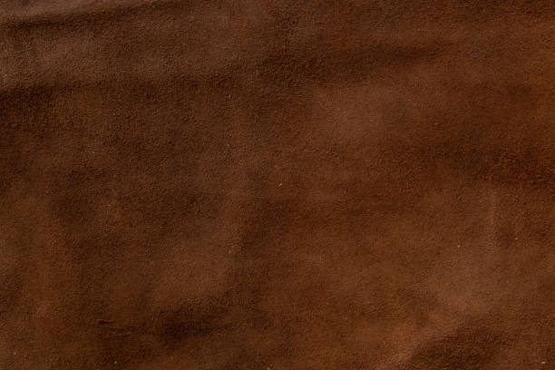 istock dark brown natural suede as a background close-up 1460179277
