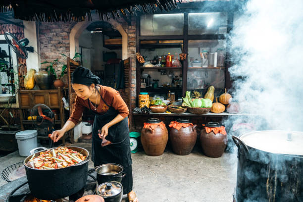 istock cooking steamed fish on open fire in restaurant 1460179373