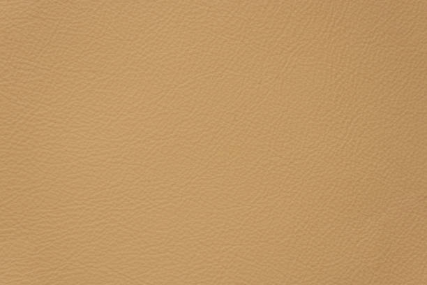istock dark brown genuine leather as a closeup background, 1460180436