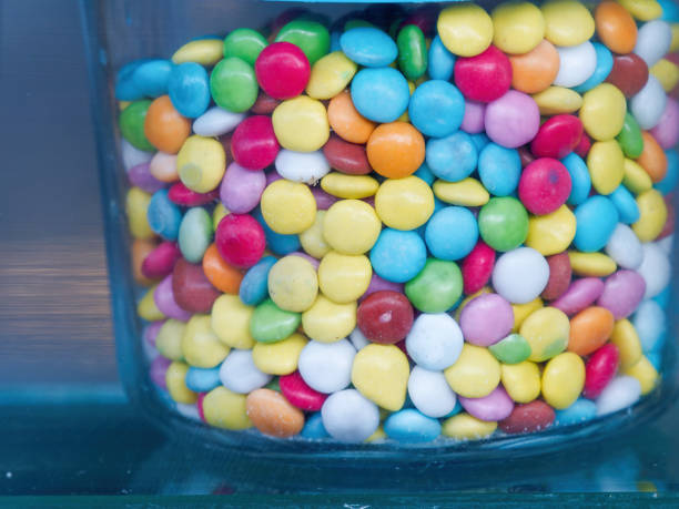 istock Colorful candies in glass jar 1460184020