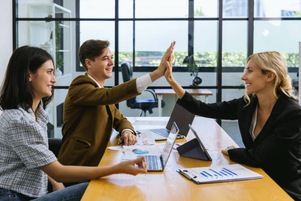 istock Business person meeting on solar cell panel technology. Business People Discussing Solar Power Environment Concept 1460185499