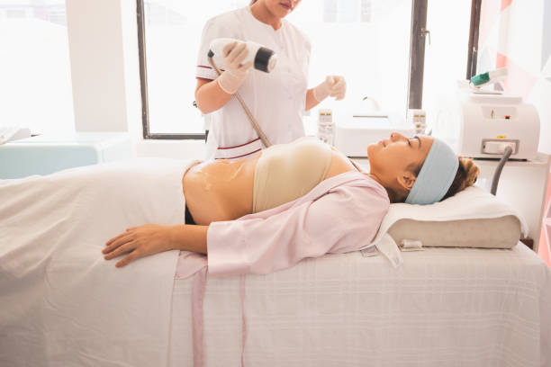 istock Young Hispanic female getting treatment at a spa 1460185692