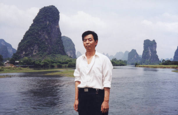 istock 1990s Chinese Men Real Life Old Photo 1460185770