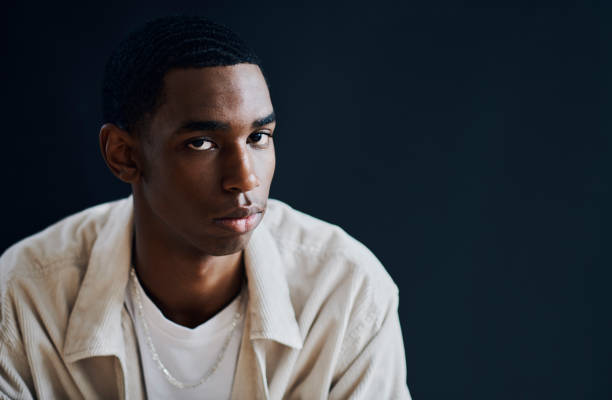 istock Portrait, black man and serious with decision, future and concentration with guy on black studio background. Face, African American male and gentleman with idea, thinking and thoughtful on backdrop 1460185839