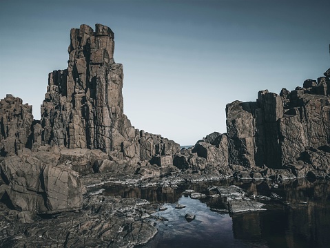 A beautiful shot of stone formations near a stream in Kiama, Australia