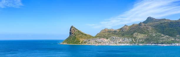 istock Panoramic shot Hout Bay with rugged coastal mountain and blue sea 1460187952