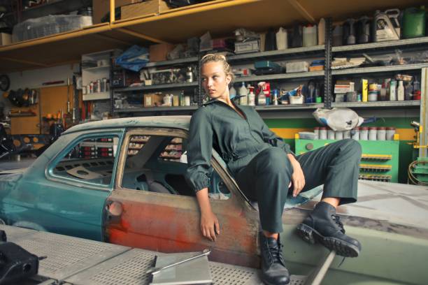 istock Female mechanician working in the garage 1460191019