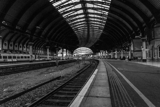istock Grayscale of an interior of an empty train station 1460192250