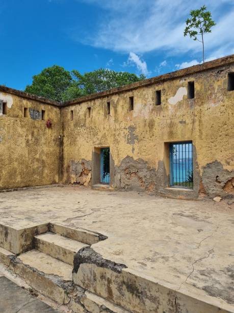 istock Old destroyed house with blue sky in the background 1460195224
