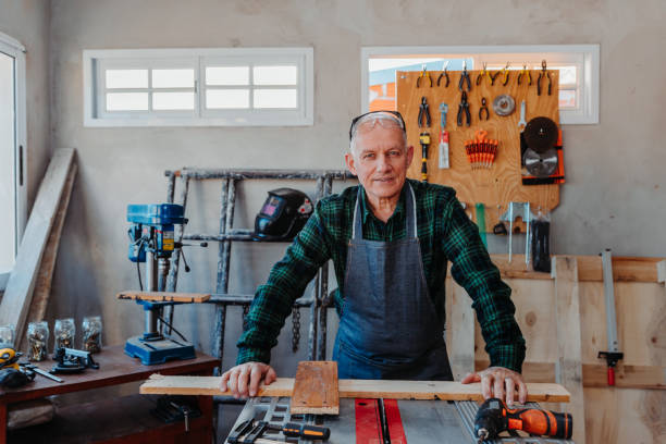 istock Senior Caucasian carpenter working in his room 1460197255