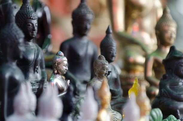istock Selective focus of metal Buddha figurines 1460197339