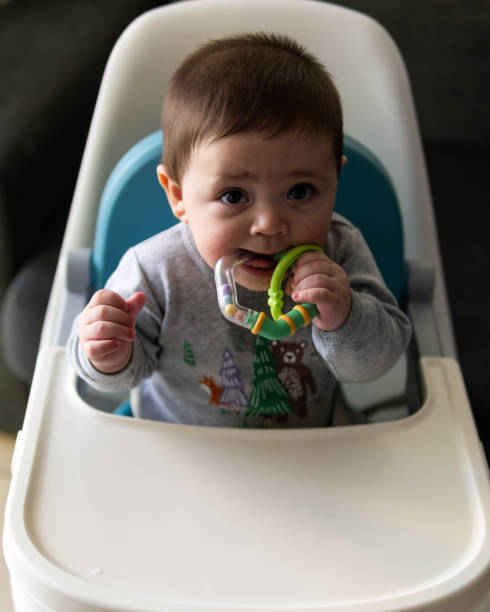 istock Cute Hispanic child on a baby walker 1460200126
