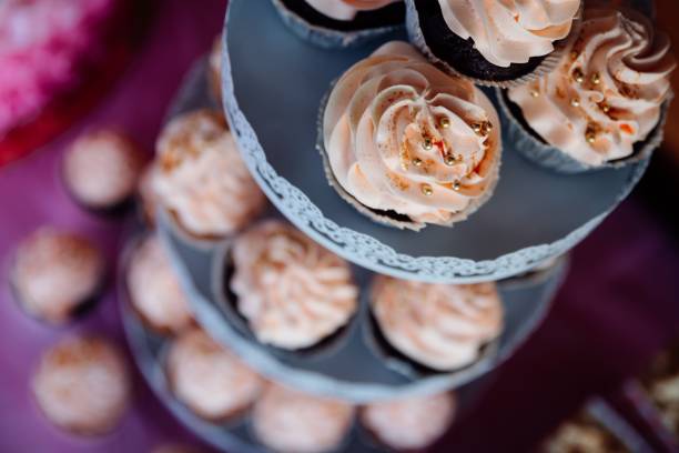istock Selective focus of cupcakes on a cake rack 1460202389