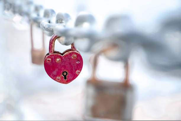 Photographed red hearts in the shape of a heart on isolated white background.