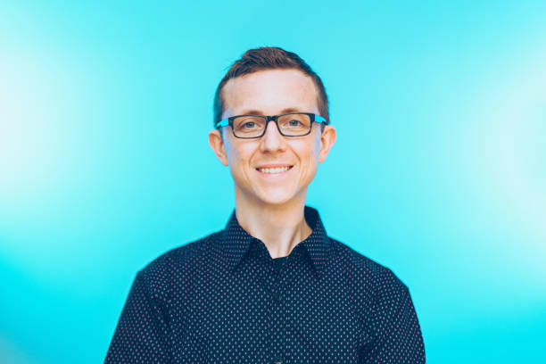 istock American man in a shirt posing on the blue gradient background 1460206770