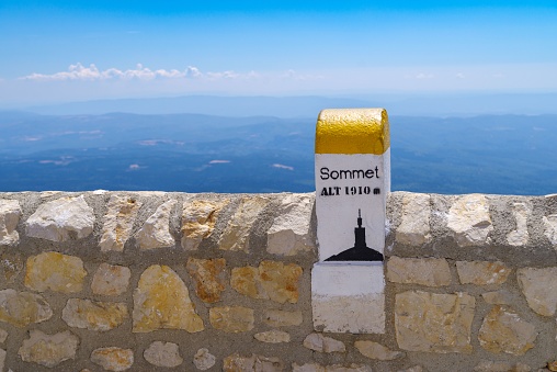 A marker stone on top of the Mont Ventoux at 1910 m. Provence region of southern France.