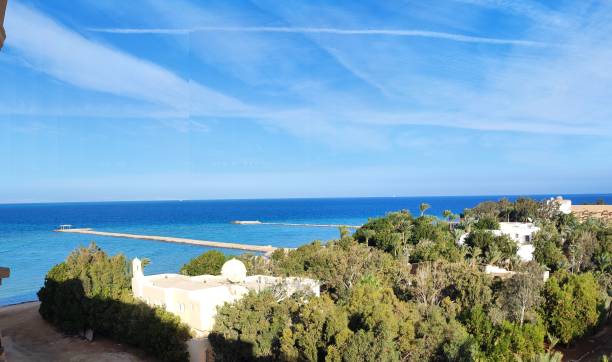 istock View of a blue sea on a sunny day 1460209078
