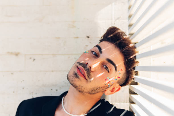 istock Calm gay man with stickers on face 1460209856