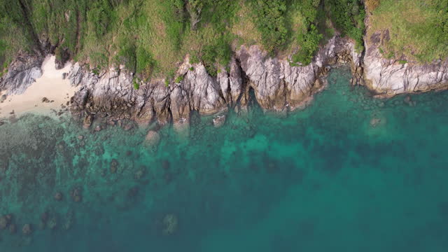 Wave sea rocky turquoise rolling slow crash rocks coastline sunset paradise island. Beach wave sand.