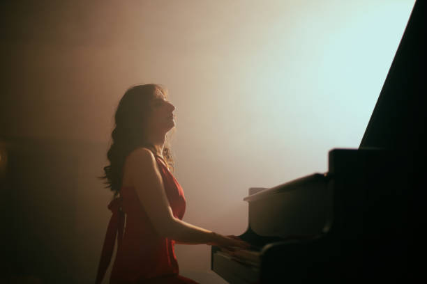 istock Woman playing the piano 1460217169