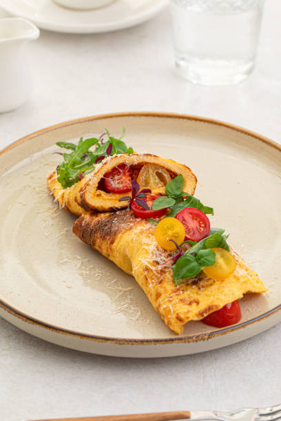 istock Omelette with tomatoes, basil and parmesan 1460217666