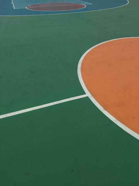 Basketball court line pattern, early afternoon