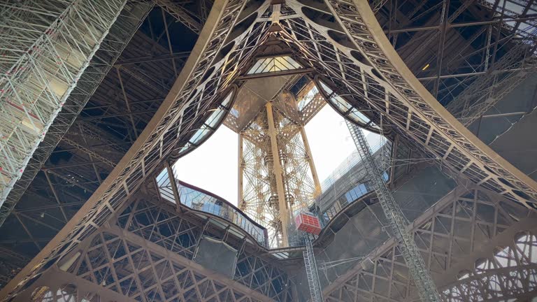 Shot from below of the first floor of the Eiffel Tower in Paris