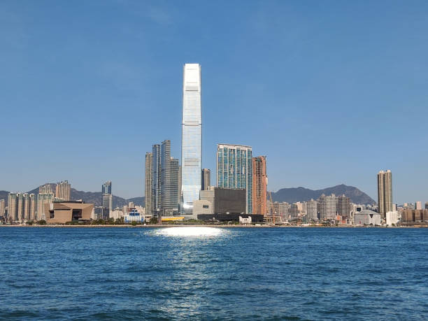 International Commerce Center, Kowloon, Hong Kong The International Commerce Center skyscraper, height 484 mt, the tallest building in Hong Kong, over Victoria Harbour, Kowloon peninsula, Hong Kong. international commerce center stock pictures, royalty-free photos & images