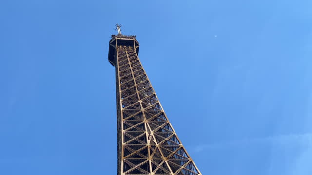 Low angle view of the Eiffel Tower on a sunny day in Paris
