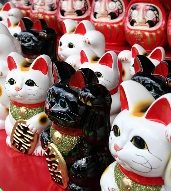 istock Neko cats asking for coins to deposit inside of them 146022512