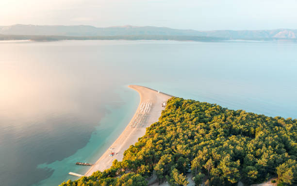 Drone view of the Golden Horn beach on the island of Brac, Croatia Drone view of the Golden Horn beach on the island of Brac, Croatia brac island stock pictures, royalty-free photos & images