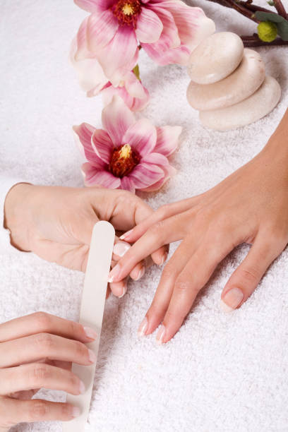 istock A woman receiving a nice manicure 146022730