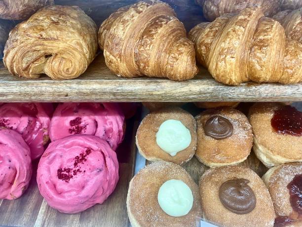 istock Fresh Baked Croissants + Doughnuts 1460227752