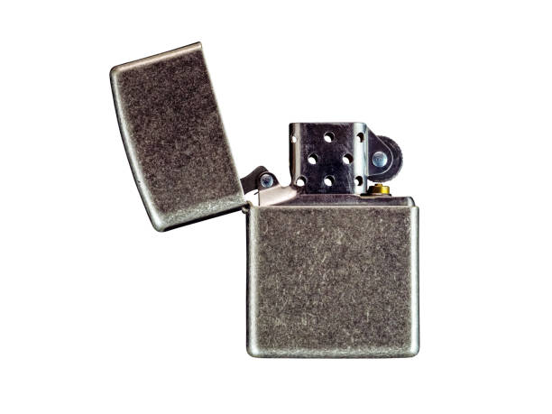 Close up old fashioned vintage zippo lighter isolated on white