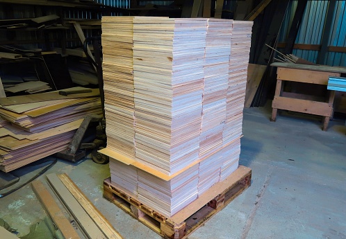 Sawn plywood in an industrial workshop
