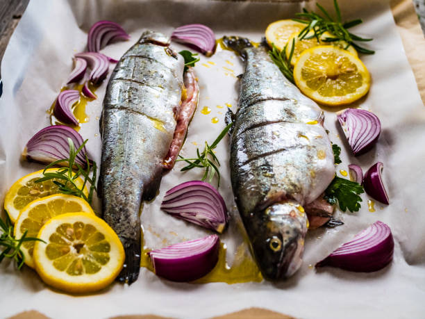istock Fish dish - prepared raw trout to cook 1460232785