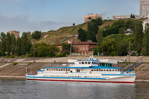 Nizhny Novgorod, Nizhny Novgorod region, Russia - July 2022: River cruise ship on the Volga in Nizhny Novgorod. River tram on the Volga.