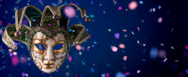 istock Venetian carnival mask among flying confetti 1460233241
