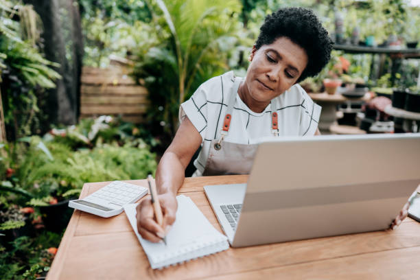 istock Florist saleswoman taking an order 1460234416