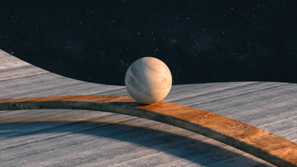 istock A wooden ball rolling along a wooden geometry on a cosmic background. Smooth light, realistic dynamics. 1460236407