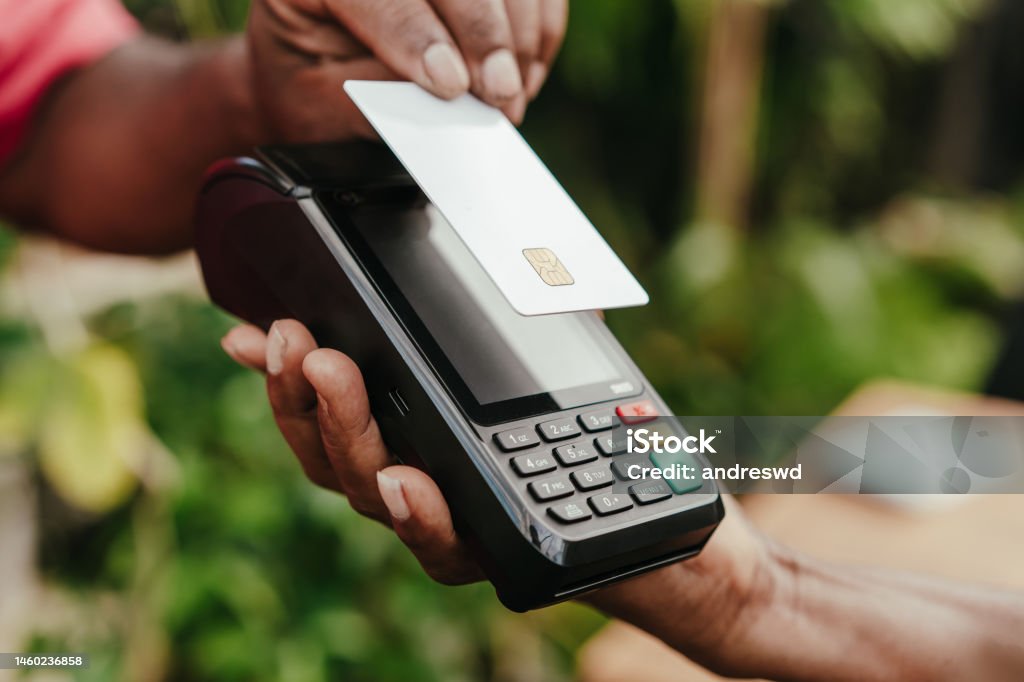 Payment by credit card approximation Credit Card Stock Photo