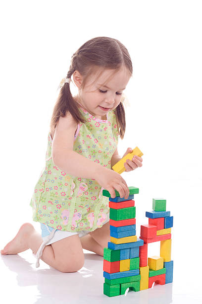 istock Little girl playing with cubes 146023752