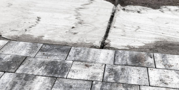 istock New gray paving slabs, street paving is in progress 1460241639