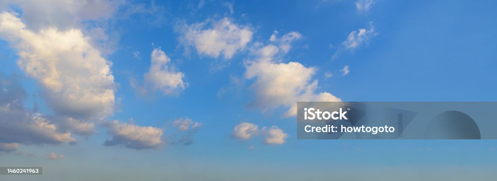 Banner Tropical summer blue sky fluffy white cloud summertime on light sunny day cloudscape. Panoramic Clear bright blue skyline spring sunlight climate background. Heaven blue ecology for web banner 4K Resolution Stock Photo